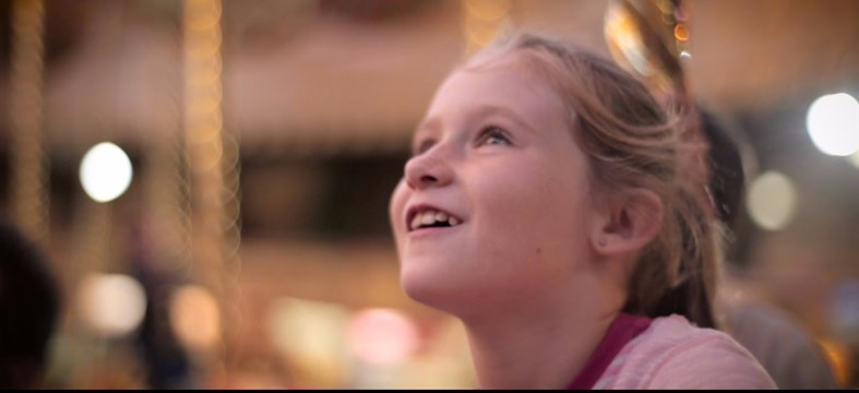 girl on carousel