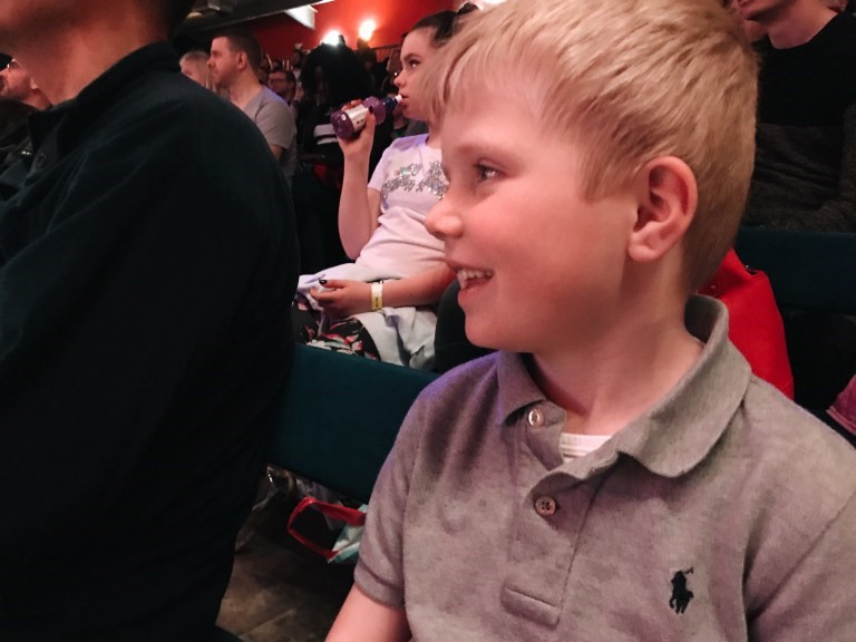 Boy watching Folly Farm theatre show